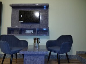 40-cm flat-screen TV with cable channels