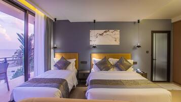 Deluxe Triple Room, Balcony, Sea View | In-room safe, desk, laptop workspace, free WiFi