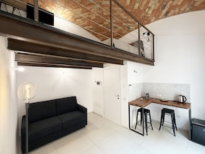 Interior - Quadruple Room with Balcony Overlooking the Main Street and Square, Air Conditioning (Calangianus)