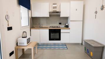 Luxury Apartment, Private Pool, Garden View | Private kitchen | Full-size fridge, microwave, oven, stovetop