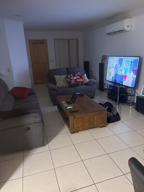 Living area - Fantastic location townhouse close to beaches , shops , bus stop (Runaway Bay)