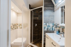 Shower, free toiletries, hair dryer, bathrobes