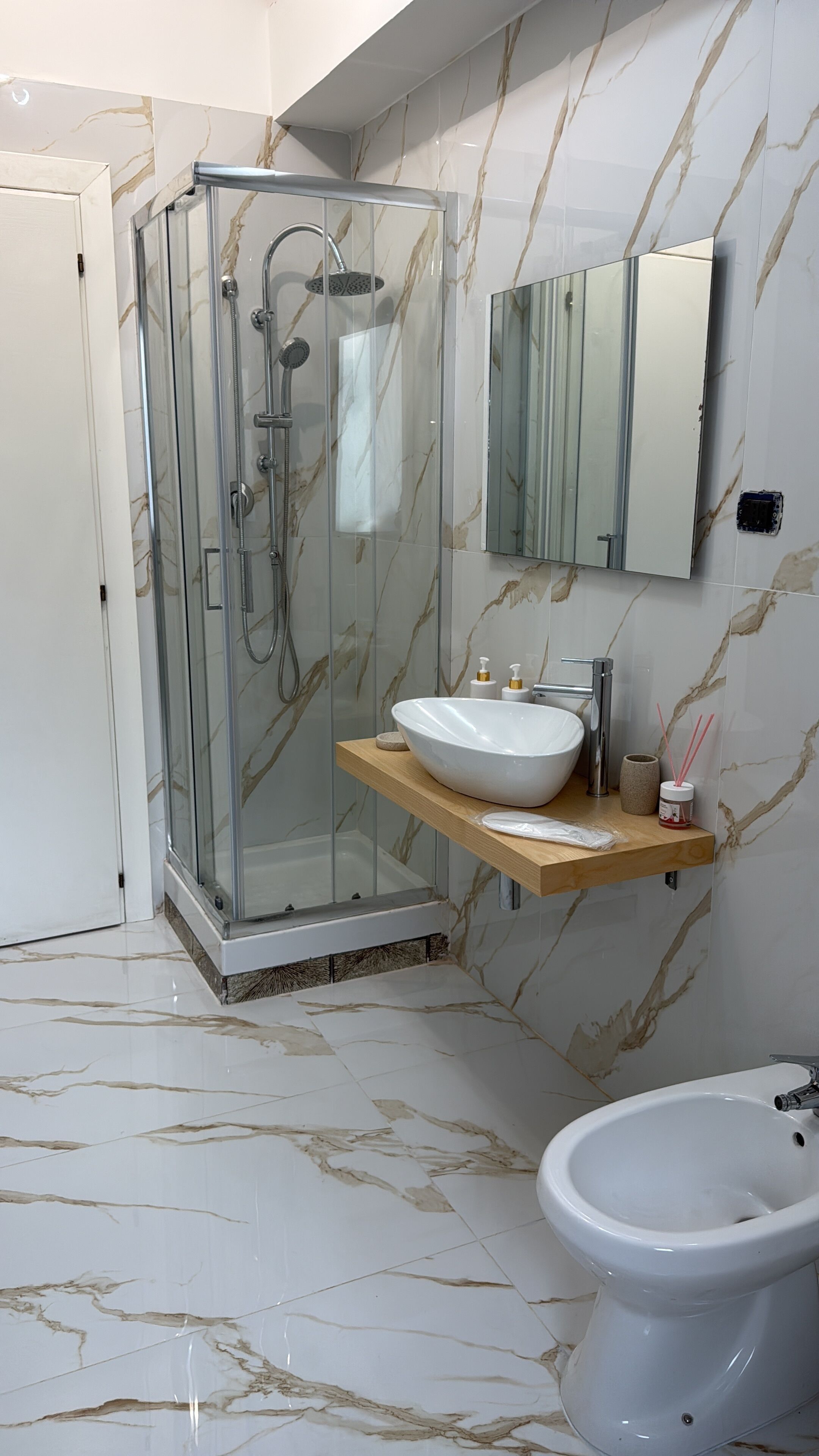Family Quadruple Room, Balcony, City View | Bathroom | Shower, free toiletries, hair dryer, slippers