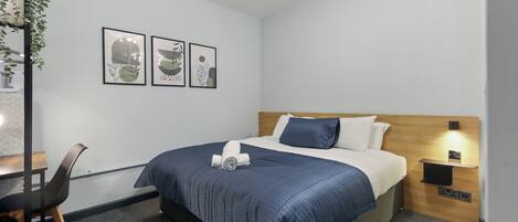 Luxury Apartment | Desk, laptop workspace, blackout drapes, soundproofing