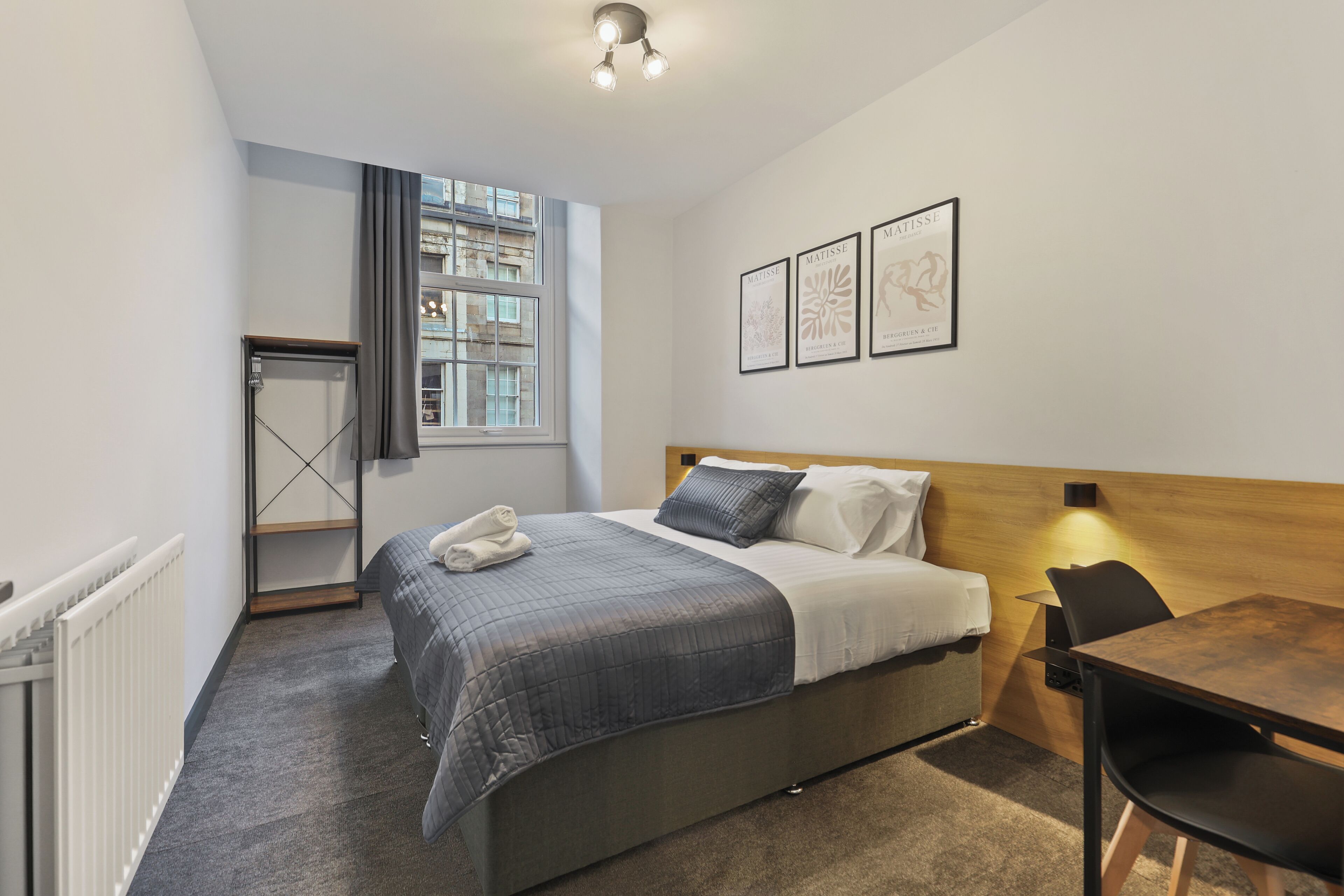 Signature Apartment | Desk, laptop workspace, blackout curtains, soundproofing