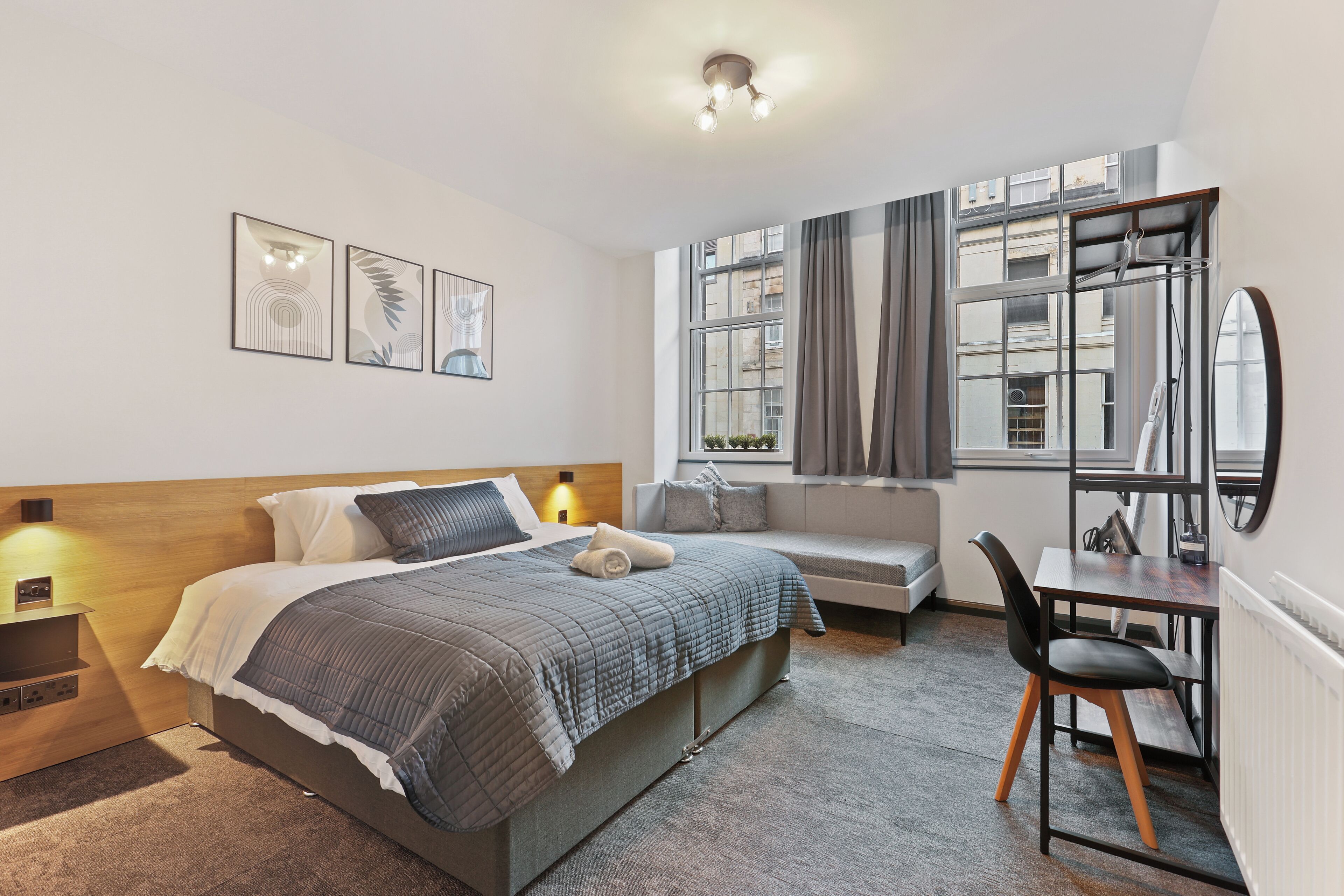 Signature Apartment | Desk, laptop workspace, blackout curtains, soundproofing