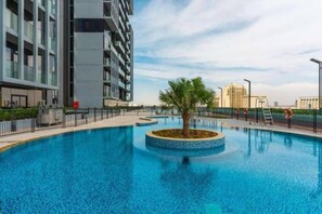 Outdoor pool - High floor 1BR vacation home with terrace (Dubai)