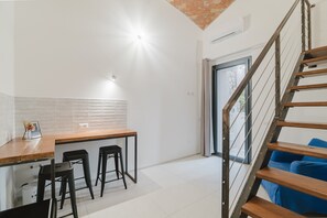 Interior - Comfort Triple Room with Private Courtyard and Air Conditioning (Calangianus)