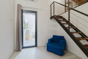 Interior - Comfort Triple Room with Private Courtyard and Air Conditioning (Calangianus)