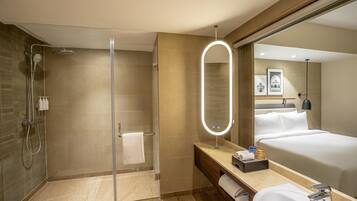 Shower, rainfall showerhead, designer toiletries, hair dryer