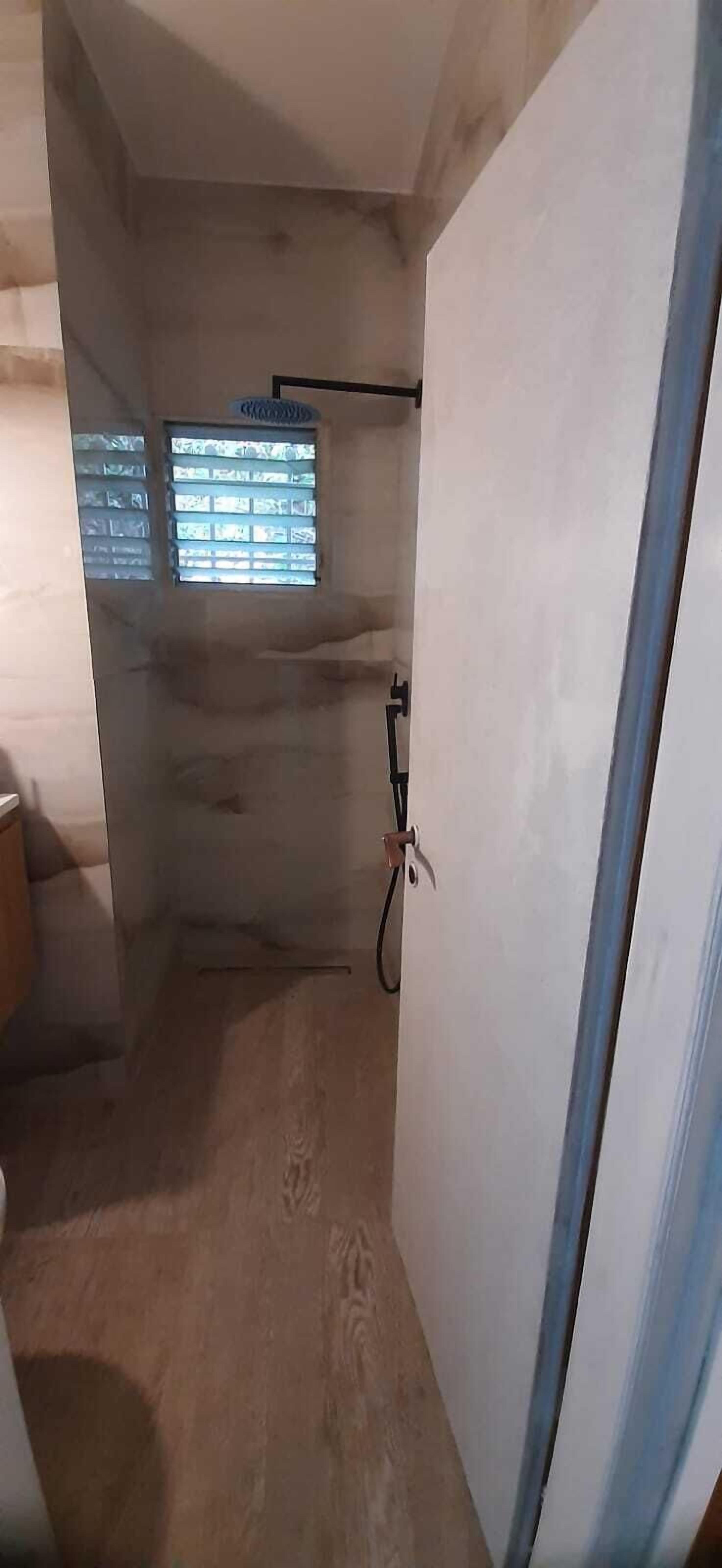Shower, towels, toilet paper