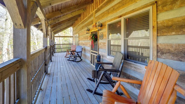 A wooden porch with rocking chairs and a wooden deck. - < 1 Mi to Linville Falls: Family Gem w/ Game Room! (Marion)