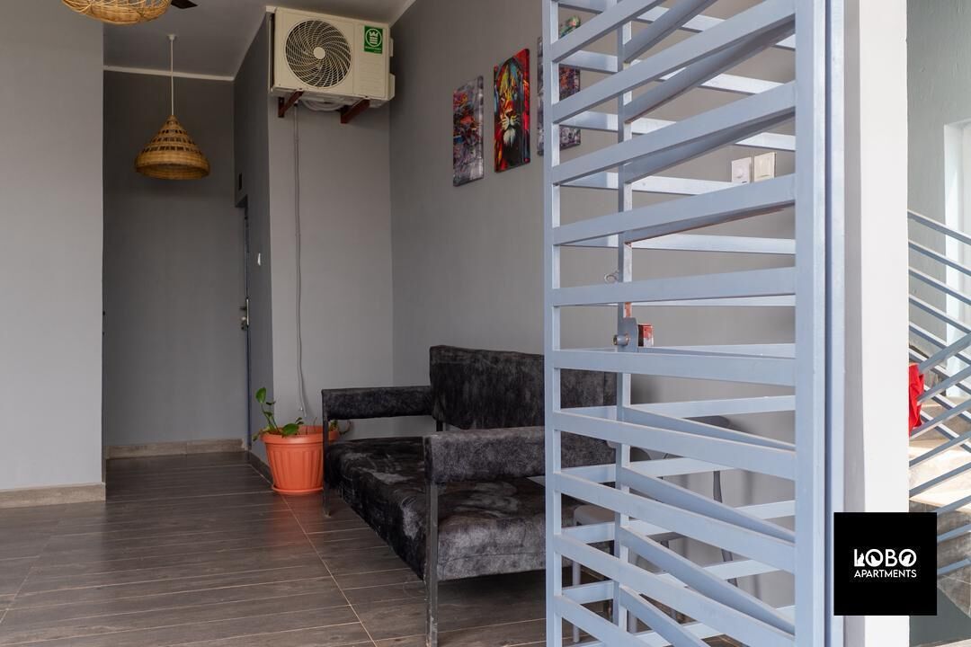 Estudio, vista a la ciudad | Área de sala de estar