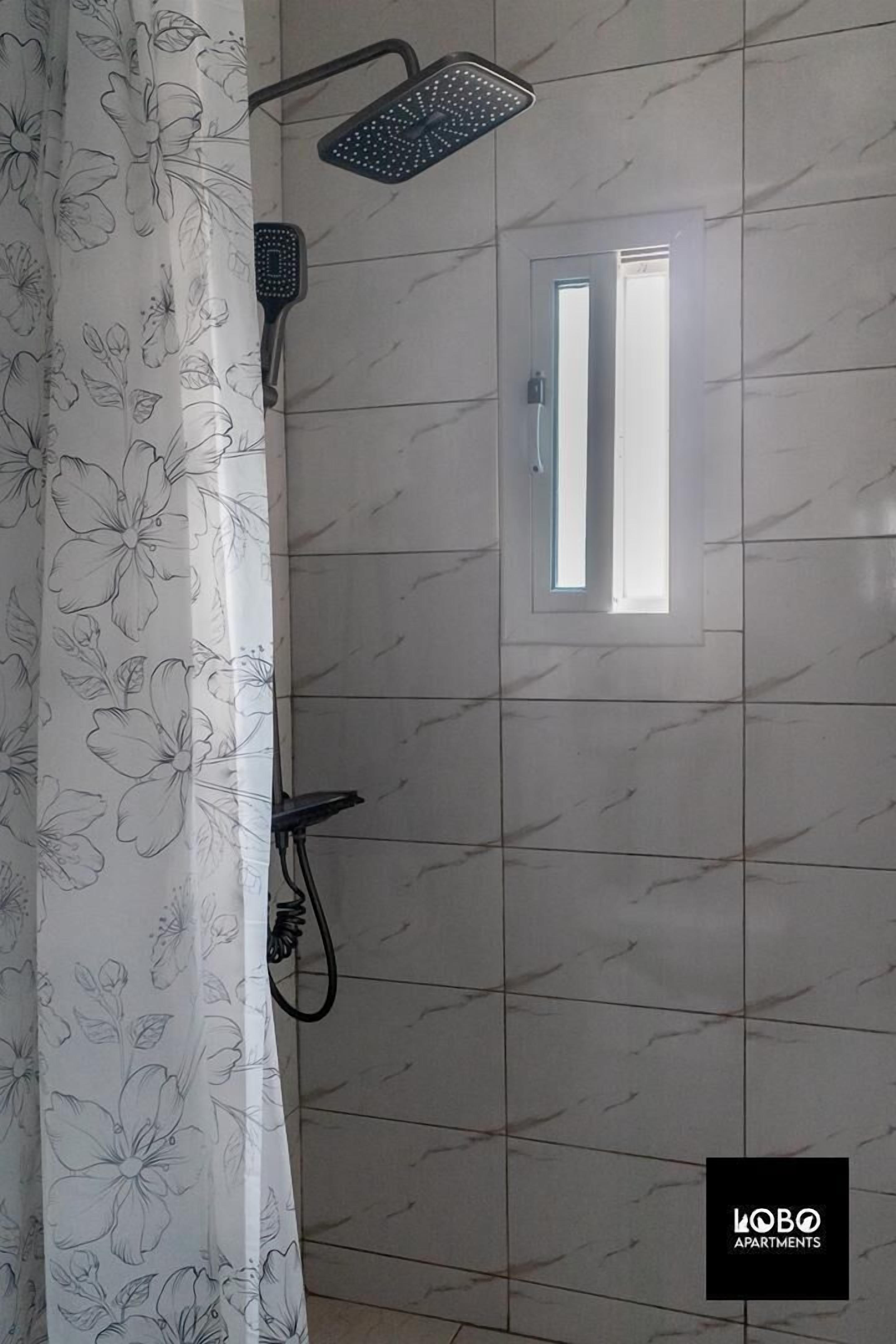 Studio, City View | Bathroom | Shower, towels, toilet paper