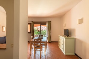 Apartment, 2 Bedrooms, Patio | Dining - Charming Sea Villas Villa Sleeps 6IN Shared Pool (Stintino)