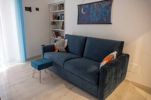 อพาร์ทเมนท์, 2 ห้องนอน, ระเบียง | ห้องนั่งเล  ่น | หนังสือ