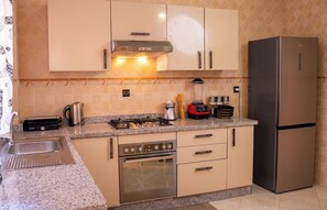 Private kitchen - Charming  2-bedroom apartment with AC in Marrakech Heart (Marrakech)