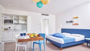 Comfort Studio | Living area | 24-inch LED TV with cable channels