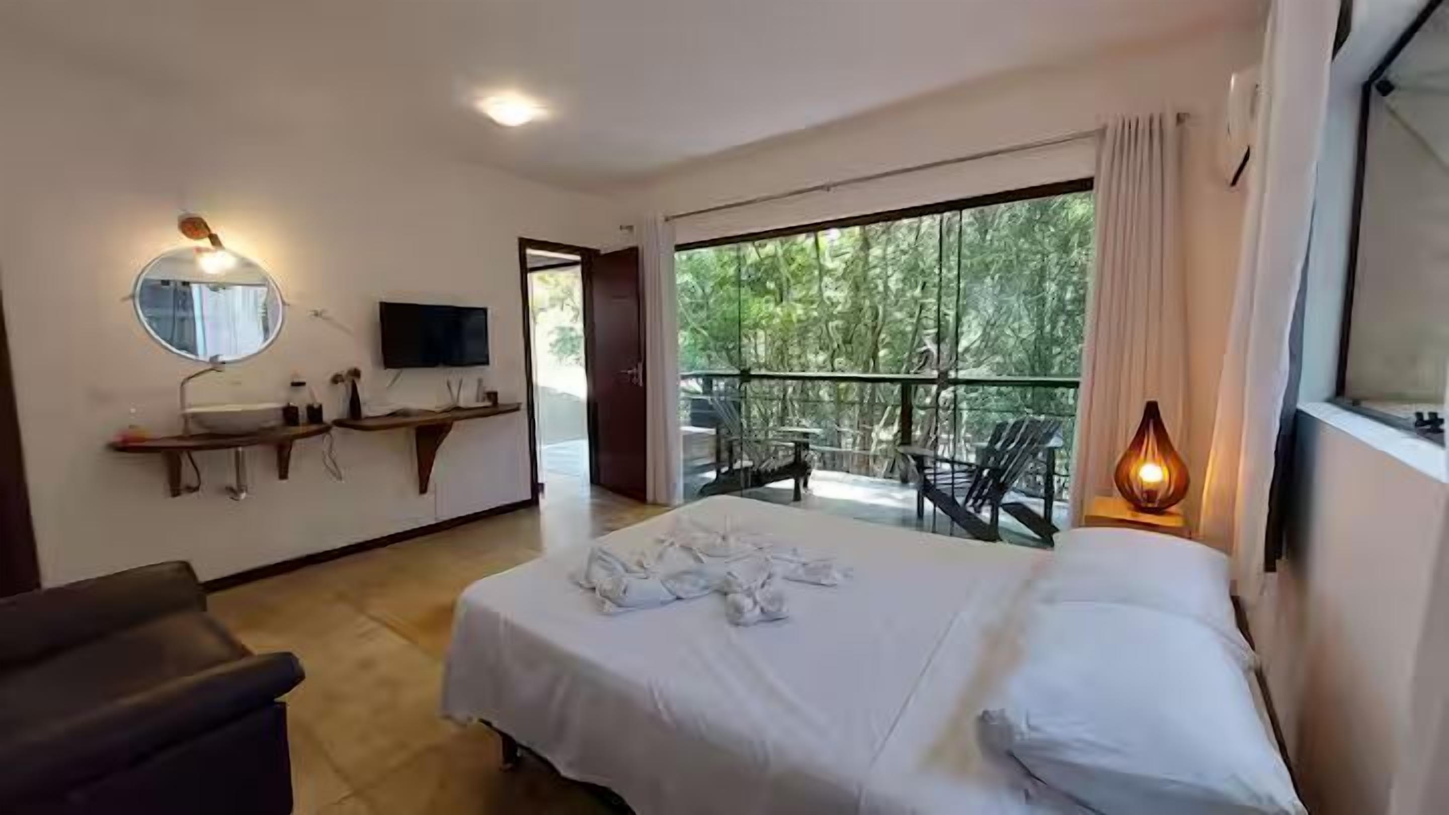 Premium-Apartment, 1 Doppelbett, Terrasse, zum Garten hin | Kostenloses WLAN, Bettwäsche