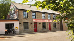 A two-story building with a sign reading "The Cresselly Inn". - Cresselly Inn (Mountain Ash)