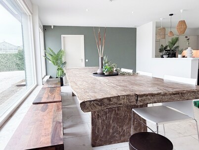 Large holiday villa designed to comfortably host up to 14 guests. Located near the forests of Tilburg and surrounded by nature, this 240 m² villa is perfect for families, groups, sports teams, and nature lovers.