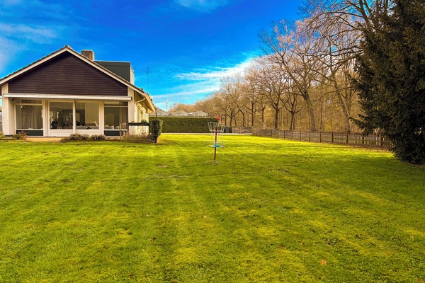 Large private garden in Tilburg property, perfect for relaxing or group gatherings.