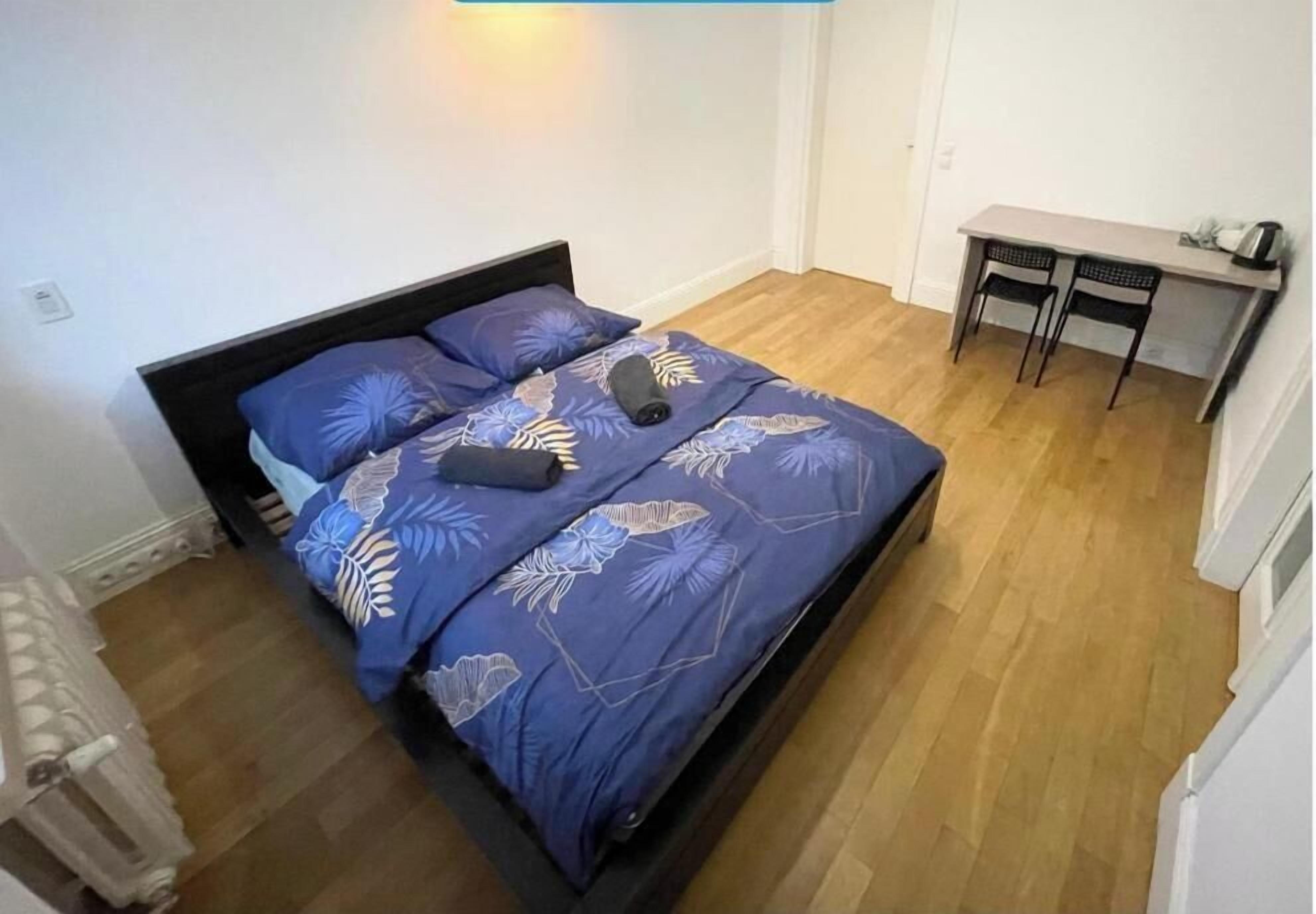 Comfort Quadruple Room, 2 Double Beds | Iron/ironing board, free WiFi