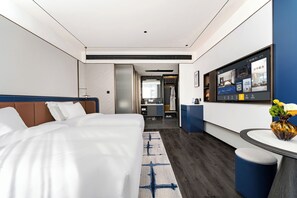 Deluxe Twin Room, City View | Desk, laptop workspace, blackout drapes, free WiFi
