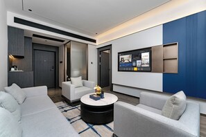 Luxury Suite, City View | Desk, laptop workspace, blackout drapes, free WiFi