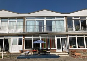 Exterior - Colourful mid-century nest moments away from bustling beaches and harbour.  (West Bay)