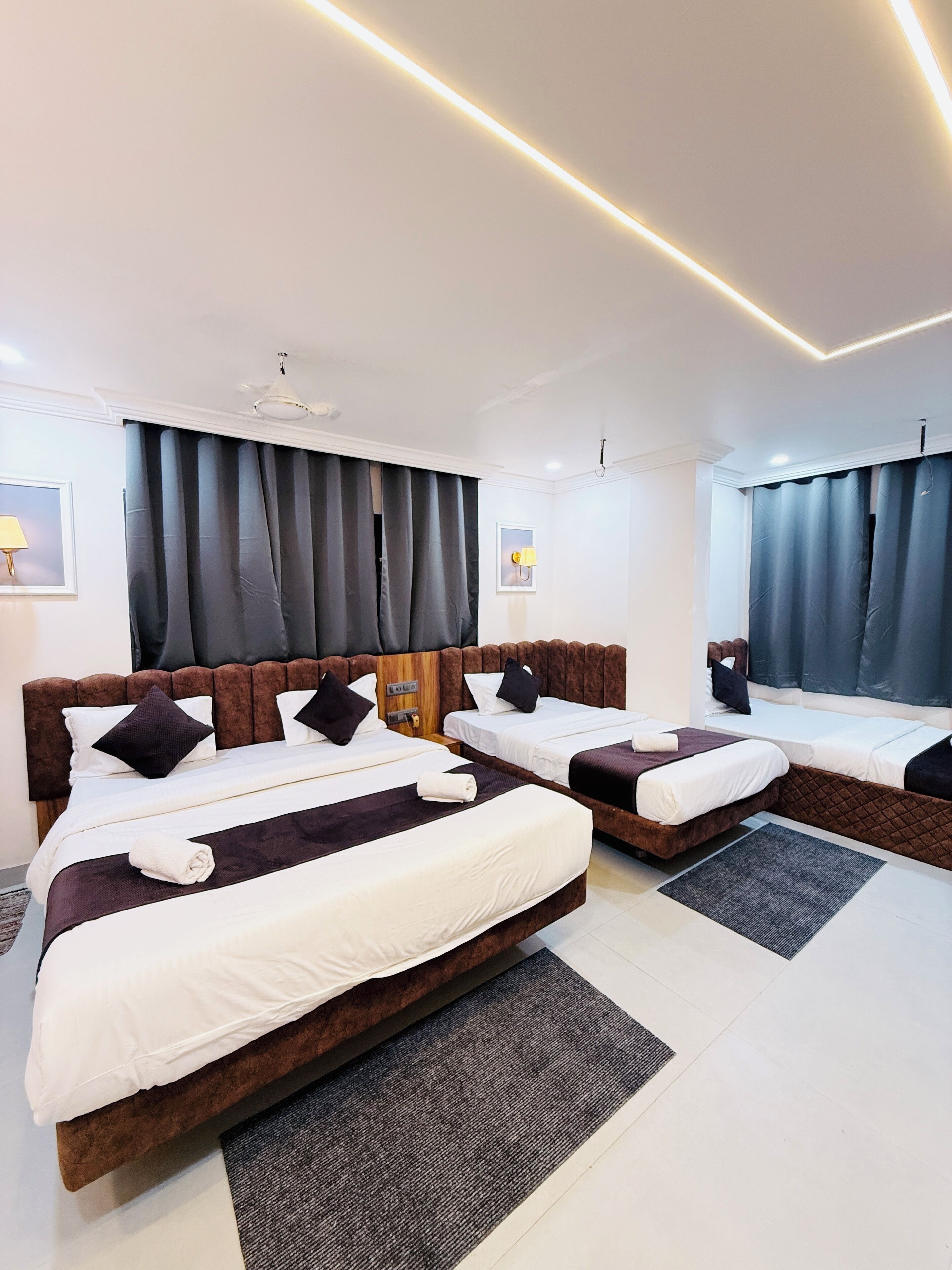 Deluxe Quadruple Room | Egyptian cotton sheets, premium bedding, in-room safe