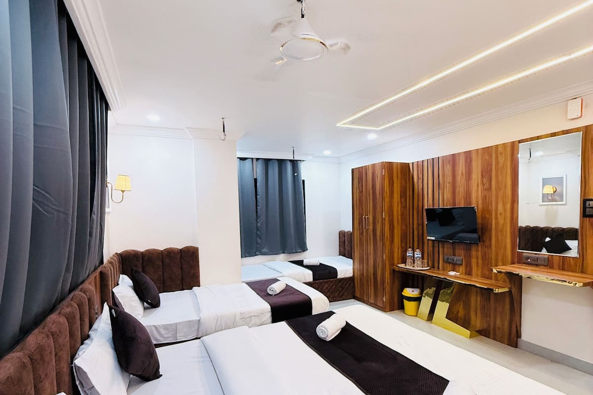 Neljän hengen deluxe-huone | Egyptinpuuvillaiset lakanat, ylelliset vuodevaatteet