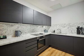 Fridge, oven, stovetop, cookware/dishes/utensils - Host & Stay | Apartment 2, Stanley Street (Liverpool)