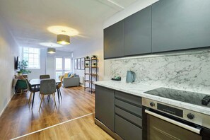 Fridge, oven, stovetop, cookware/dishes/utensils - Host & Stay | Apartment 2, Stanley Street (Liverpool)