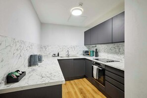 Fridge, oven, stovetop, cookware/dishes/utensils - Host & Stay | Apartment 10, Stanley Street (Liverpool)