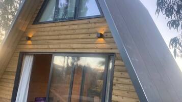 Deluxe House, Balcony, Garden View | Terrace/patio