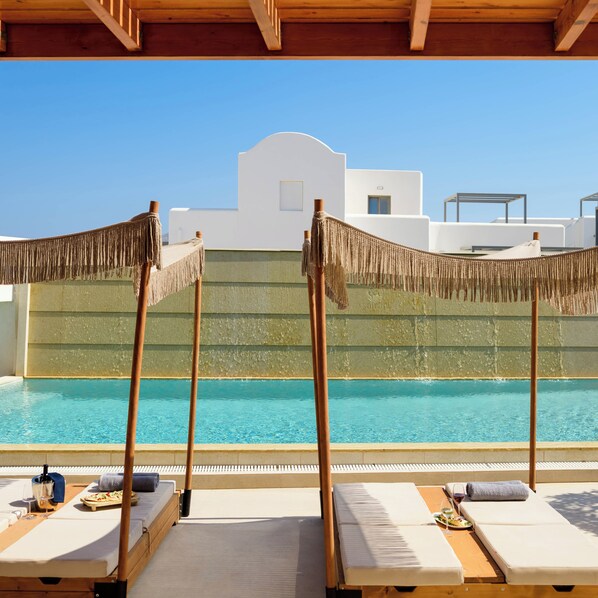 Outdoor pool, open 11:00 AM to 8:00 PM, pool umbrellas, sun loungers - Safrani Suites (Santorini)