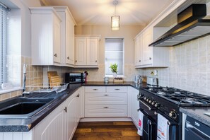 Fridge, microwave, oven, stovetop - Beach Hill House, 3 bedroom property with private parking and garden (Rhos on Sea)