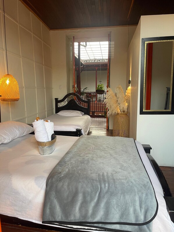 Standard Triple Room, Balcony, City View | Premium bedding, laptop workspace, free WiFi, bed sheets