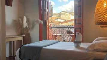 Premium bedding, laptop workspace, free WiFi, bed sheets