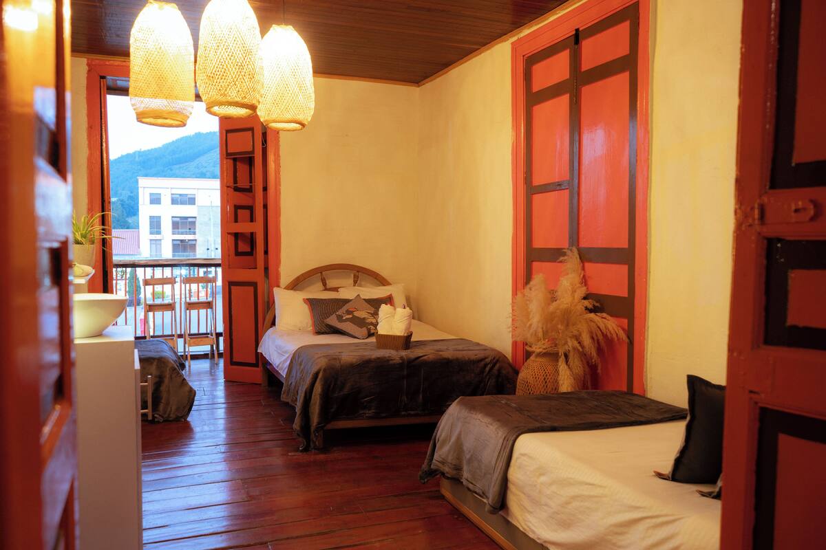 Standard Quadruple Room, Balcony, City View | Premium bedding, laptop workspace, WiFi (free), bed sheets