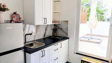 Studio, Beach View | Private kitchen | Full-sized fridge, stovetop, cookware/dishes/utensils