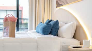 Colchones con pillow-top, cortinas blackout, wifi gratis y ropa de cama