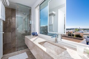 Deluxe Double Room, Balcony, Partial Ocean View | Bathroom | Shower, hair dryer, bathrobes, towels - Neïra Boutique Hotel & Spa (Sidi Bou Said)