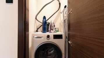 Deluxe Apartment, Balcony, Pool View | Laundry