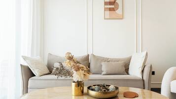 Deluxe Apartment, Balcony, Pool View | Living area