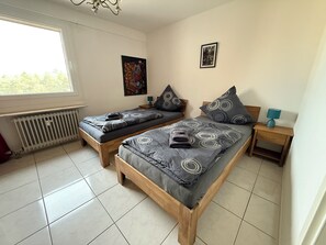 2 habitaciones, tabla de planchar con plancha y wifi gratis 