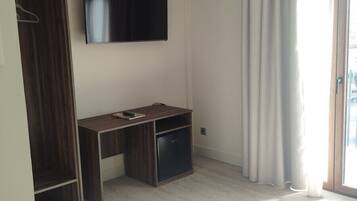 Premium bedding, desk, laptop workspace, soundproofing