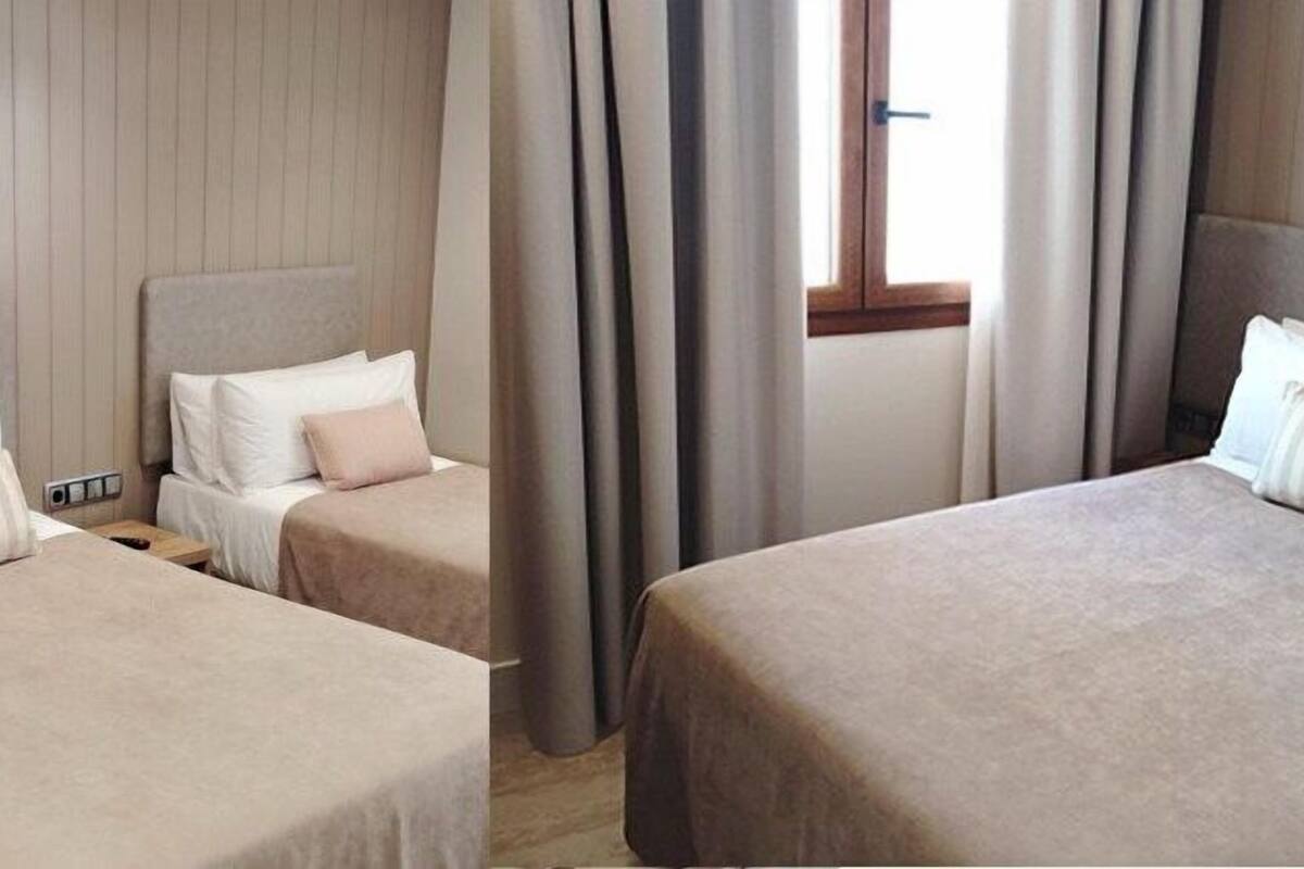 Premium bedding, desk, laptop workspace, soundproofing