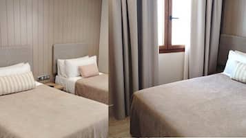 Family Room | Desk, laptop workspace, free WiFi, bed sheets